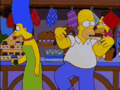 a cartoon of homer simpson and marjorie simpson standing next to each other