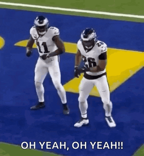 two football players are dancing on the field with the words oh yeah oh yeah !