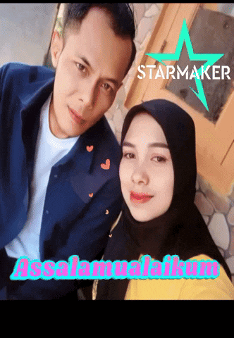a man and a woman are posing for a picture and the words starmaker are on the bottom