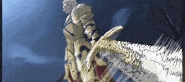 a man in a gold armor is holding a large sword in his hands .