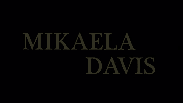 a black background with the name mikaela davis in white letters