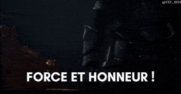 a man in armor is holding a sword with the words force et honneur written below it