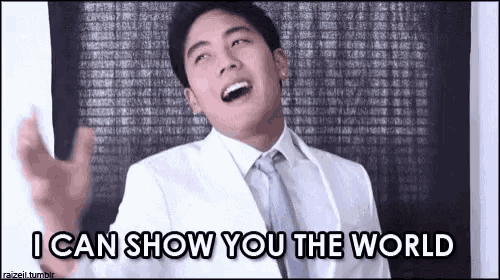 a man in a white suit and tie is laughing and saying i can show you the world