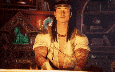 a man with long hair is meditating with his eyes closed in a room .
