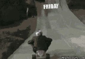 a person is riding a scooter down a hill with a sign that says friday