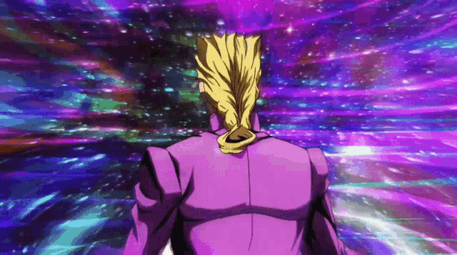 a man in a purple suit is standing in front of a colorful background .