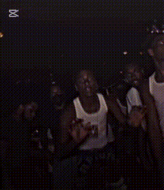 a group of people are posing for a picture and one of them is wearing a shirt that says ' dirty ' on it