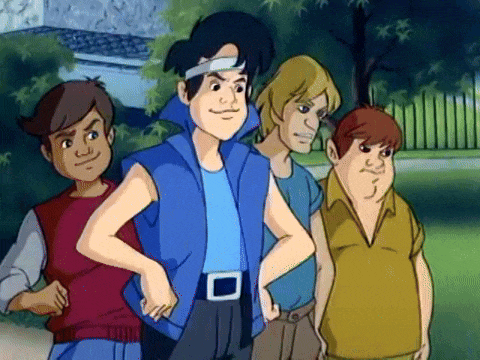 a group of cartoon characters are posing for a picture