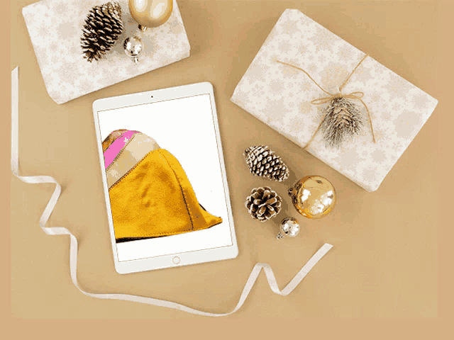 a tablet with a picture of a yellow hat on the screen