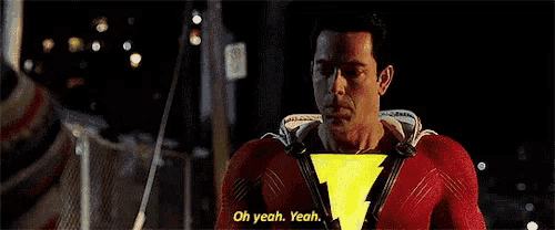 a man in a superhero costume says oh yeah yeah