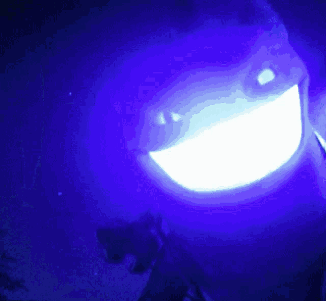 a blue background with a white circle in the center