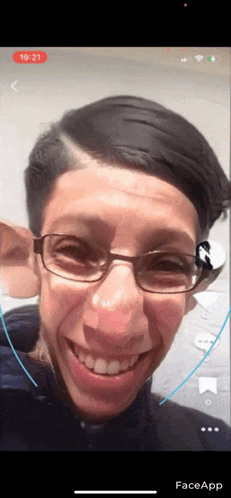 a screenshot of a face app shows a man wearing glasses