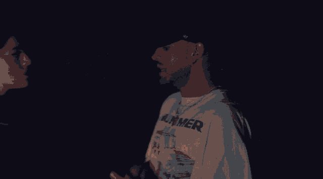 a man wearing a shirt that says runner on it