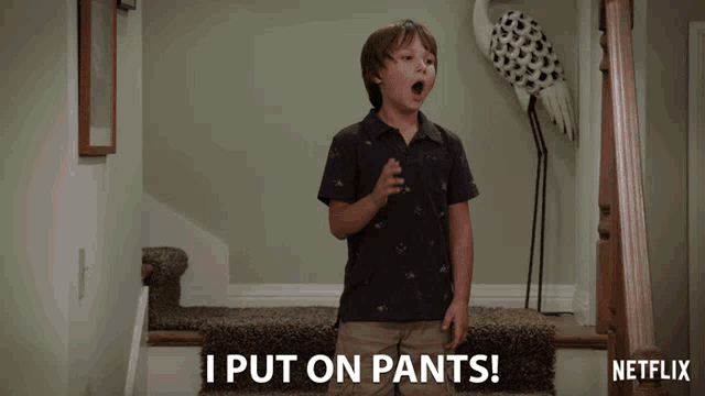a boy standing on a set of stairs with a netflix logo in the corner