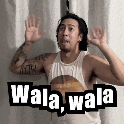 a man wearing a white tank top with the words wala wala written on it