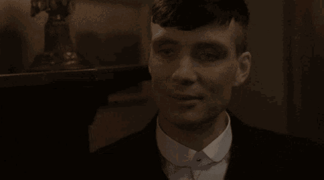 a man in a suit and white shirt says " i 'm a man who drinks tea "
