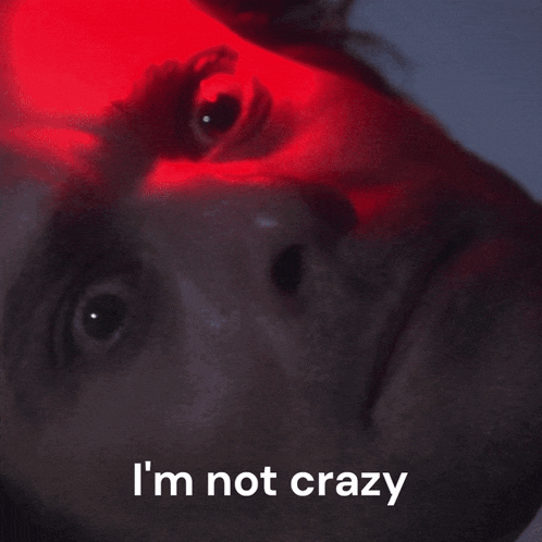 a close up of a man 's face and the words i 'm not crazy