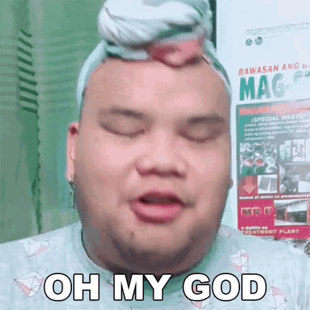 a man with a scarf on his head is making a funny face and saying oh my god .