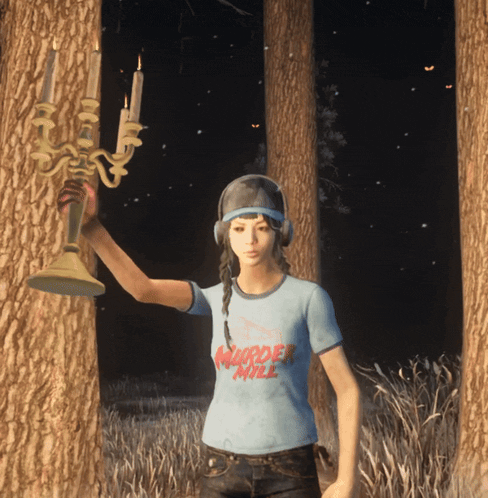 a woman wearing a shirt that says murder mile is holding a candelabra