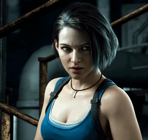 a woman wearing a blue tank top and a black necklace with a key on it