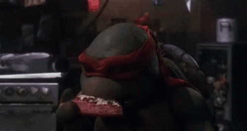 Tmnt Michelangelo GIF - Tmnt Michelangelo Eating Pizza GIFs