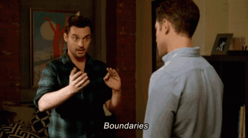 a man talking to another man with the word boundaries on the screen