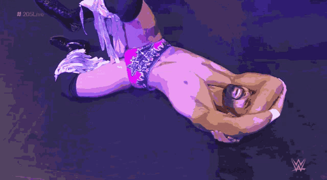a pixel art of a man laying on his back with a w logo in the corner