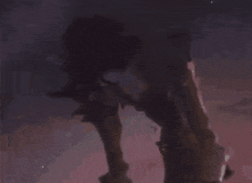 a close up of a person 's face with a blurred background .
