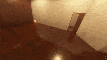 an empty room with a door and a mirror