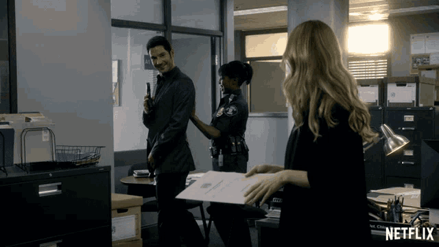a netflix ad shows a man and a woman in an office