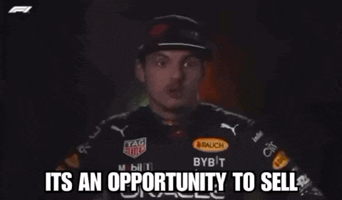 a man in a racing uniform is talking about a opportunity to sell .