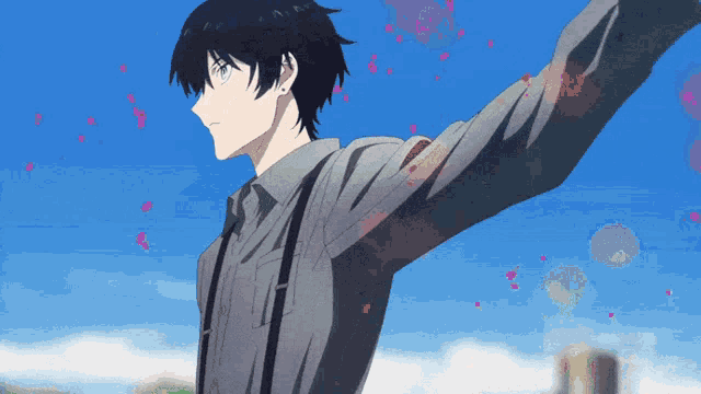 a man with his arms outstretched in front of a blue sky surrounded by pink petals .