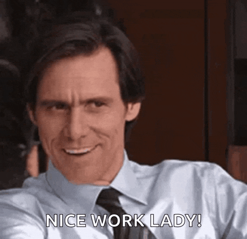 a man in a white shirt and tie is smiling and saying `` nice work lady '' .