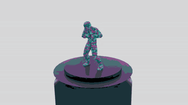 a colorful statue of a man standing on top of a black object