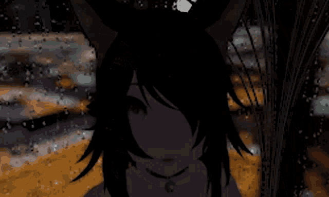 a girl with cat ears is looking out a window with rain drops on it .