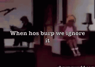 a woman is sitting on a couch with the words when hos burp we ignore it written above her