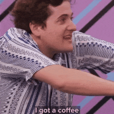 a man in a blue and white striped shirt is talking about having a coffee .