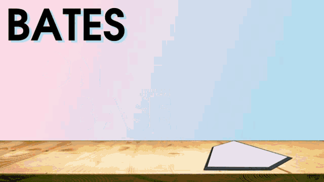 a glass of bates on basis sits on a table