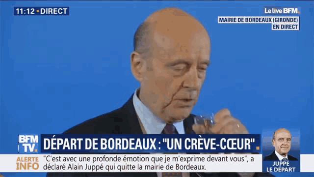 a man drinking from a glass with the words depart de bordeaux on the screen