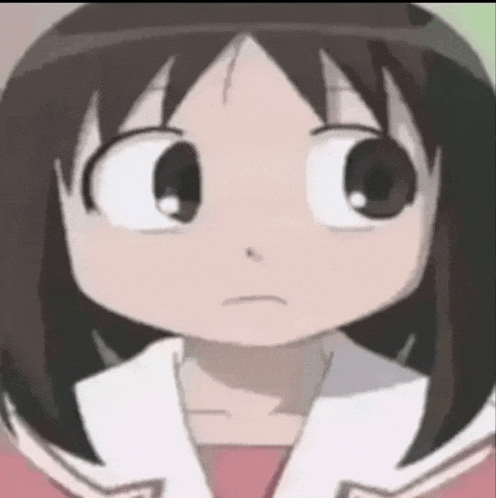 a close up of a cartoon girl 's face making a funny face .