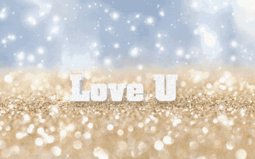the word love is written in white on a glittery background