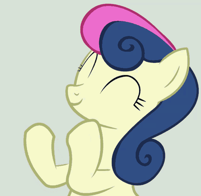 a cartoon pony with a pink and blue hat on