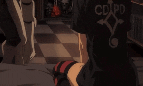 a person wearing a black shirt that says cdpd on it