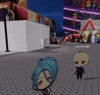 a couple of anime characters standing next to each other in front of a ferris wheel in a video game .