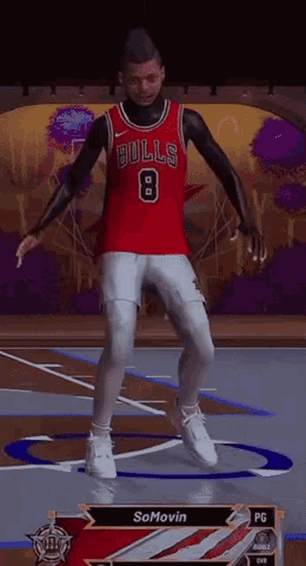 a man in a red bulls jersey is dancing on a basketball court