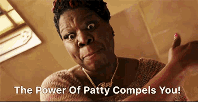 a woman giving a thumbs up with the words " the power of patty compels you "