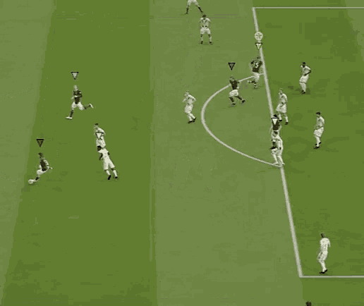a group of soccer players on a field with the goal xl written on the side of the field