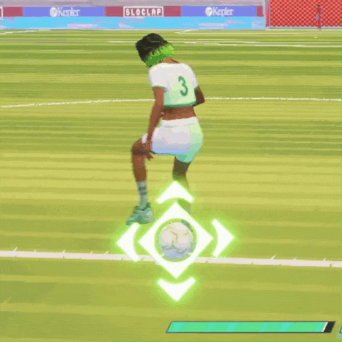 a woman in a crop top is kicking a soccer ball on a soccer field