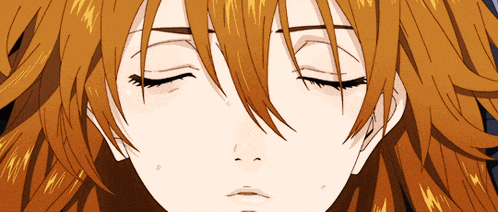 a close up of a girl 's face with closed eyes