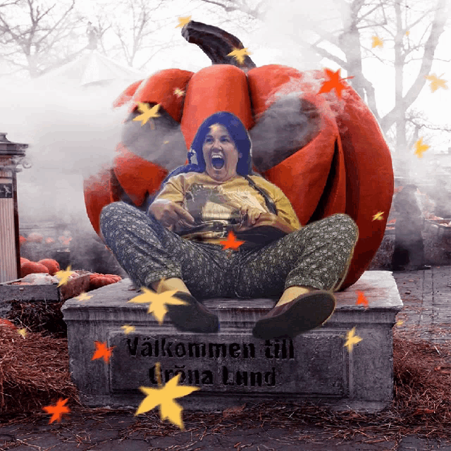 a woman is sitting in a pumpkin with the words välkommen till gröna lund written on the bottom